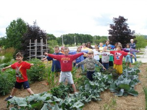 kids pretending to be scarecrows