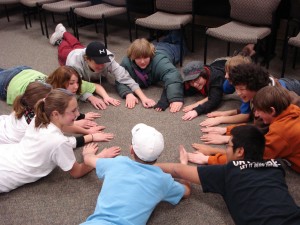 Youth playing a game called hand zap