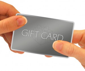 person holding a gift card