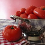 fresh tomatoes in a colander