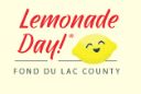 Lemonade Day written in red with a yellow smiley lemon with Fond du Lac County written below it.