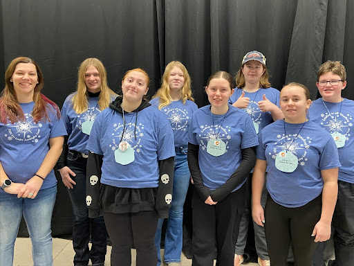 Fond du Lac County Youth who attend Winter Leadership Camp along with Tracy Keifenheim, 4-H Educator are all wearing blue shirts.